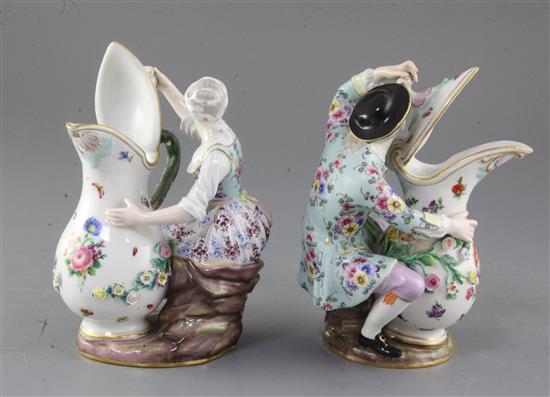 A pair of Meissen figural ewers, 19th century, height 18.5cm and 19.5cm